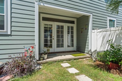 Charming Townhome with Carriage House in Desirable Southwood on Southwood Golf Club in Florida - for sale on GolfHomes.com, golf home, golf lot