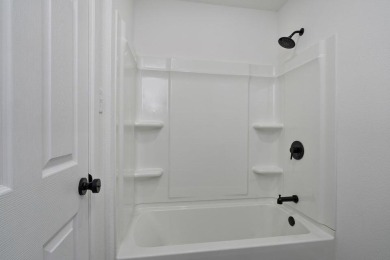 Beautifully renovated and perfectly located near Horton Smith on Horton Smith Golf Course in Missouri - for sale on GolfHomes.com, golf home, golf lot