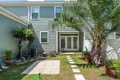 Charming Townhome with Carriage House in Desirable Southwood on Southwood Golf Club in Florida - for sale on GolfHomes.com, golf home, golf lot