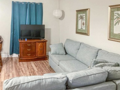 Charming Townhome with Carriage House in Desirable Southwood on Southwood Golf Club in Florida - for sale on GolfHomes.com, golf home, golf lot