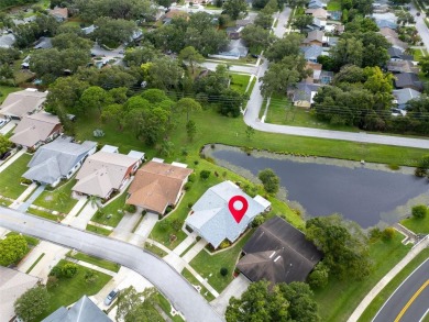 Welcome to this beautifully updated villa in Palm Harbor's on Highland Lakes Executive Golf Course in Florida - for sale on GolfHomes.com, golf home, golf lot
