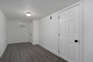 Beautifully renovated and perfectly located near Horton Smith on Horton Smith Golf Course in Missouri - for sale on GolfHomes.com, golf home, golf lot