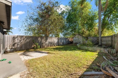 Come see this 2 bedroom 1.5 bathrooms, 1 car garage, END UNIT on East Bay Golf Club in Florida - for sale on GolfHomes.com, golf home, golf lot