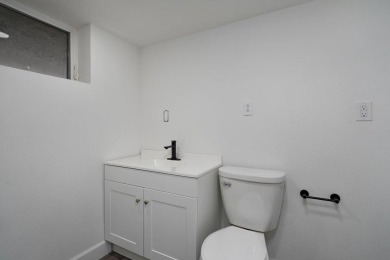 Beautifully renovated and perfectly located near Horton Smith on Horton Smith Golf Course in Missouri - for sale on GolfHomes.com, golf home, golf lot