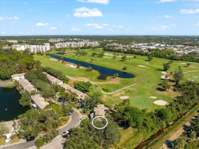 Come see this 2 bedroom 1.5 bathrooms, 1 car garage, END UNIT on East Bay Golf Club in Florida - for sale on GolfHomes.com, golf home, golf lot