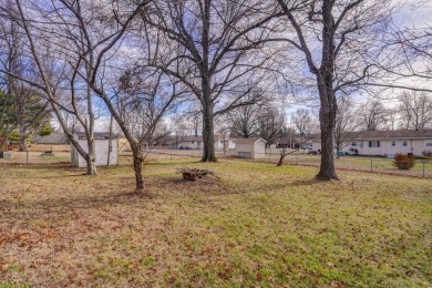 Beautifully renovated and perfectly located near Horton Smith on Horton Smith Golf Course in Missouri - for sale on GolfHomes.com, golf home, golf lot