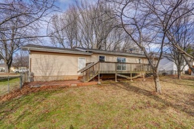 Beautifully renovated and perfectly located near Horton Smith on Horton Smith Golf Course in Missouri - for sale on GolfHomes.com, golf home, golf lot