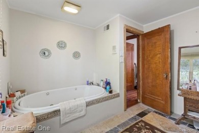 Welcome to 939 S Highland, a rare and remarkable opportunity in on Dearborn Hills Golf Course in Michigan - for sale on GolfHomes.com, golf home, golf lot