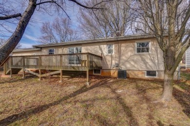 Beautifully renovated and perfectly located near Horton Smith on Horton Smith Golf Course in Missouri - for sale on GolfHomes.com, golf home, golf lot