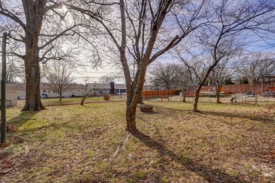 Beautifully renovated and perfectly located near Horton Smith on Horton Smith Golf Course in Missouri - for sale on GolfHomes.com, golf home, golf lot