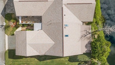 Live the New Smyrna Beach lifestyle in this beautifully on Hidden Lakes Golf Club in Florida - for sale on GolfHomes.com, golf home, golf lot