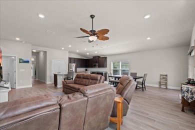 Welcome to 4 Eastmoor Ln, Palm Coast, FL 32164, an inviting and on The Grand Club Cypress Course in Florida - for sale on GolfHomes.com, golf home, golf lot