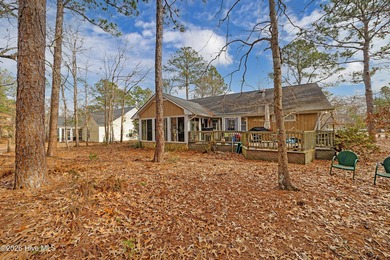 Tucked away on a wooded lot in Fairfield Harbour, this inviting on Harbour Point Golf Club in North Carolina - for sale on GolfHomes.com, golf home, golf lot