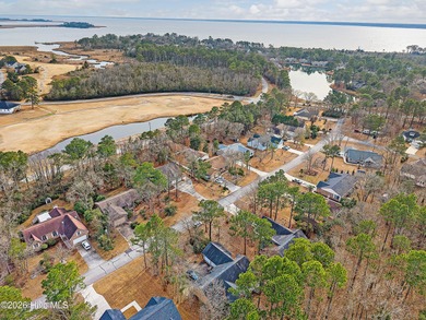 Tucked away on a wooded lot in Fairfield Harbour, this inviting on Harbour Point Golf Club in North Carolina - for sale on GolfHomes.com, golf home, golf lot