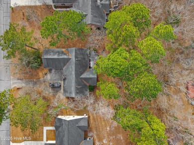 Tucked away on a wooded lot in Fairfield Harbour, this inviting on Harbour Point Golf Club in North Carolina - for sale on GolfHomes.com, golf home, golf lot