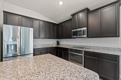 Welcome to 4 Eastmoor Ln, Palm Coast, FL 32164, an inviting and on The Grand Club Cypress Course in Florida - for sale on GolfHomes.com, golf home, golf lot
