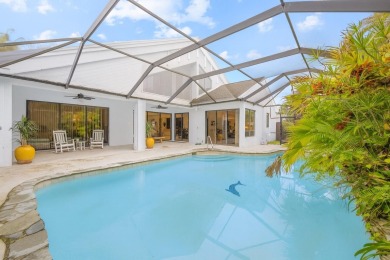 Welcome to this architectural gem in Eastpointe Country Club on Eastpointe Country Club in Florida - for sale on GolfHomes.com, golf home, golf lot