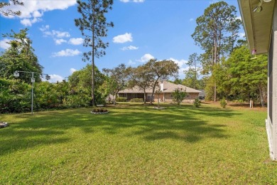 Welcome to 4 Eastmoor Ln, Palm Coast, FL 32164, an inviting and on The Grand Club Cypress Course in Florida - for sale on GolfHomes.com, golf home, golf lot