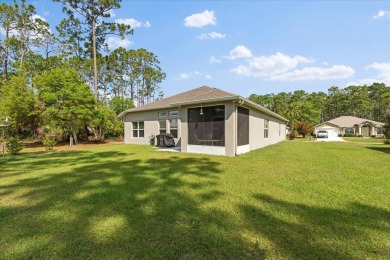 Welcome to 4 Eastmoor Ln, Palm Coast, FL 32164, an inviting and on The Grand Club Cypress Course in Florida - for sale on GolfHomes.com, golf home, golf lot
