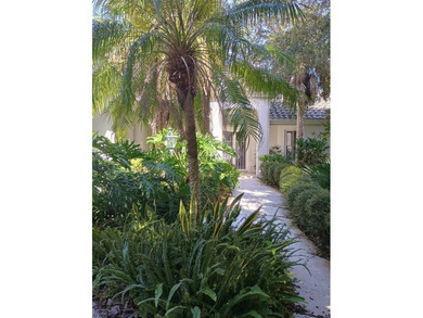 Listen to the waves crashing on the beach from this custom pool on Hammock Dunes Club in Florida - for sale on GolfHomes.com, golf home, golf lot