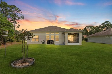 Welcome to 4 Eastmoor Ln, Palm Coast, FL 32164, an inviting and on The Grand Club Cypress Course in Florida - for sale on GolfHomes.com, golf home, golf lot