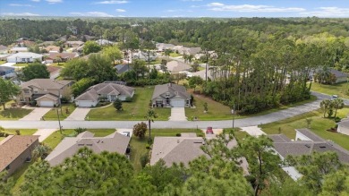 Welcome to 4 Eastmoor Ln, Palm Coast, FL 32164, an inviting and on The Grand Club Cypress Course in Florida - for sale on GolfHomes.com, golf home, golf lot