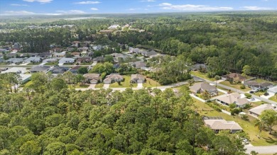 Welcome to 4 Eastmoor Ln, Palm Coast, FL 32164, an inviting and on The Grand Club Cypress Course in Florida - for sale on GolfHomes.com, golf home, golf lot