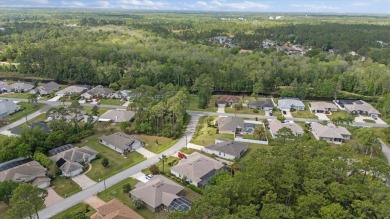 Welcome to 4 Eastmoor Ln, Palm Coast, FL 32164, an inviting and on The Grand Club Cypress Course in Florida - for sale on GolfHomes.com, golf home, golf lot