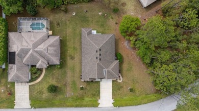Welcome to 4 Eastmoor Ln, Palm Coast, FL 32164, an inviting and on The Grand Club Cypress Course in Florida - for sale on GolfHomes.com, golf home, golf lot