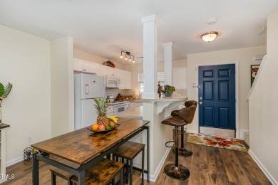 Modern style, unbeatable location, and low-maintenance on Hedingham Golf and Athletic Club in North Carolina - for sale on GolfHomes.com, golf home, golf lot