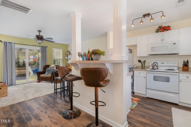 Modern style, unbeatable location, and low-maintenance on Hedingham Golf and Athletic Club in North Carolina - for sale on GolfHomes.com, golf home, golf lot