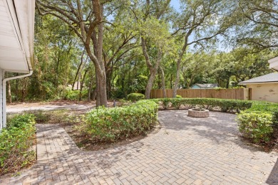 Nestled on a spacious 1/3-acre corner lot backing to a peaceful on Golf Club at Bluewater Bay Resort in Florida - for sale on GolfHomes.com, golf home, golf lot