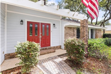 Nestled on a spacious 1/3-acre corner lot backing to a peaceful on Golf Club at Bluewater Bay Resort in Florida - for sale on GolfHomes.com, golf home, golf lot