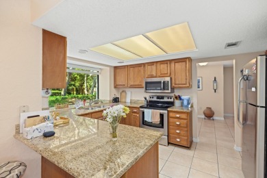 Nestled on a spacious 1/3-acre corner lot backing to a peaceful on Golf Club at Bluewater Bay Resort in Florida - for sale on GolfHomes.com, golf home, golf lot