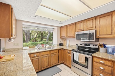 Nestled on a spacious 1/3-acre corner lot backing to a peaceful on Golf Club at Bluewater Bay Resort in Florida - for sale on GolfHomes.com, golf home, golf lot