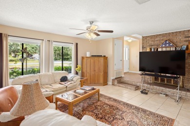 Nestled on a spacious 1/3-acre corner lot backing to a peaceful on Golf Club at Bluewater Bay Resort in Florida - for sale on GolfHomes.com, golf home, golf lot