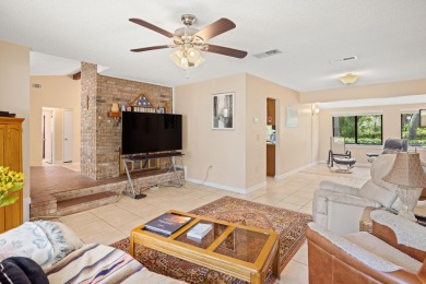 Nestled on a spacious 1/3-acre corner lot backing to a peaceful on Golf Club at Bluewater Bay Resort in Florida - for sale on GolfHomes.com, golf home, golf lot