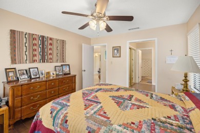 Nestled on a spacious 1/3-acre corner lot backing to a peaceful on Golf Club at Bluewater Bay Resort in Florida - for sale on GolfHomes.com, golf home, golf lot