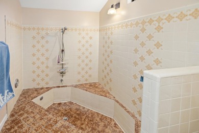 Nestled on a spacious 1/3-acre corner lot backing to a peaceful on Golf Club at Bluewater Bay Resort in Florida - for sale on GolfHomes.com, golf home, golf lot