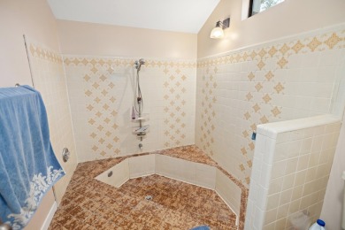 Nestled on a spacious 1/3-acre corner lot backing to a peaceful on Golf Club at Bluewater Bay Resort in Florida - for sale on GolfHomes.com, golf home, golf lot