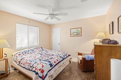 Nestled on a spacious 1/3-acre corner lot backing to a peaceful on Golf Club at Bluewater Bay Resort in Florida - for sale on GolfHomes.com, golf home, golf lot