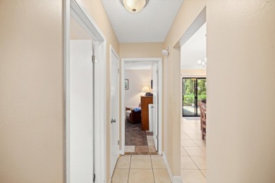 Nestled on a spacious 1/3-acre corner lot backing to a peaceful on Golf Club at Bluewater Bay Resort in Florida - for sale on GolfHomes.com, golf home, golf lot