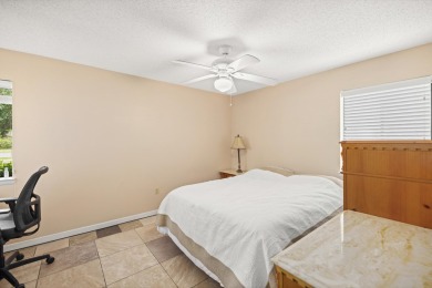 Nestled on a spacious 1/3-acre corner lot backing to a peaceful on Golf Club at Bluewater Bay Resort in Florida - for sale on GolfHomes.com, golf home, golf lot