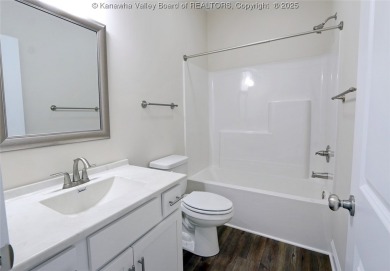 Stunning new construction home with a bright open layout with on Little Creek Country Club in West Virginia - for sale on GolfHomes.com, golf home, golf lot