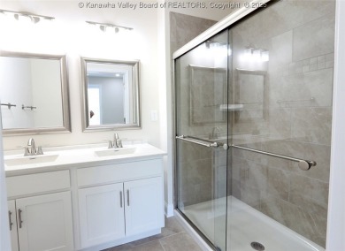 Stunning new construction home with a bright open layout with on Little Creek Country Club in West Virginia - for sale on GolfHomes.com, golf home, golf lot