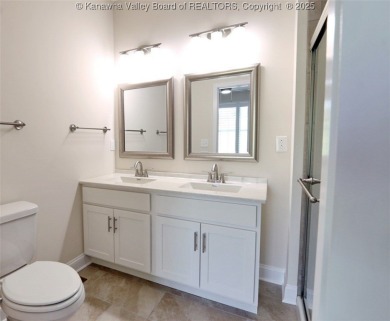 Stunning new construction home with a bright open layout with on Little Creek Country Club in West Virginia - for sale on GolfHomes.com, golf home, golf lot