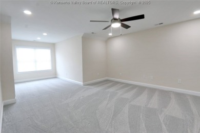Stunning new construction home with a bright open layout with on Little Creek Country Club in West Virginia - for sale on GolfHomes.com, golf home, golf lot