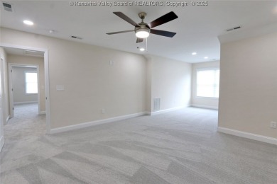 Stunning new construction home with a bright open layout with on Little Creek Country Club in West Virginia - for sale on GolfHomes.com, golf home, golf lot
