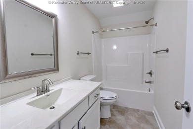 Stunning new construction home with a bright open layout with on Little Creek Country Club in West Virginia - for sale on GolfHomes.com, golf home, golf lot