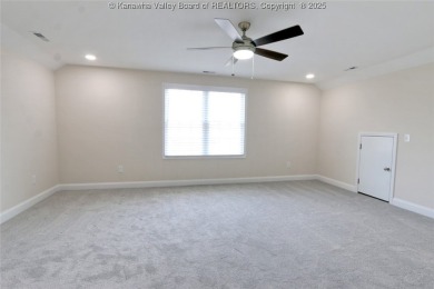 Stunning new construction home with a bright open layout with on Little Creek Country Club in West Virginia - for sale on GolfHomes.com, golf home, golf lot